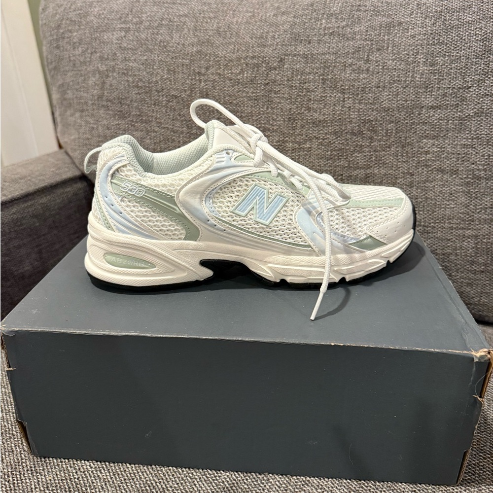New Balance White and Light Blue Athletic Shoes